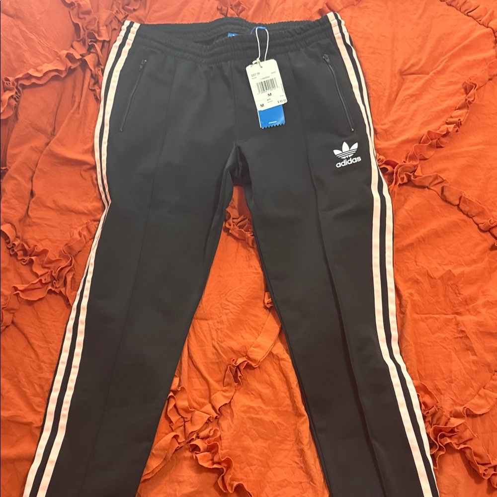 Adidas women Black Joggers with White Stripes
